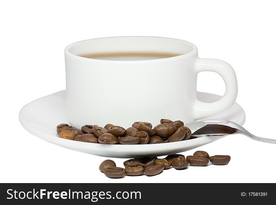 Isolated coffee cup and beans