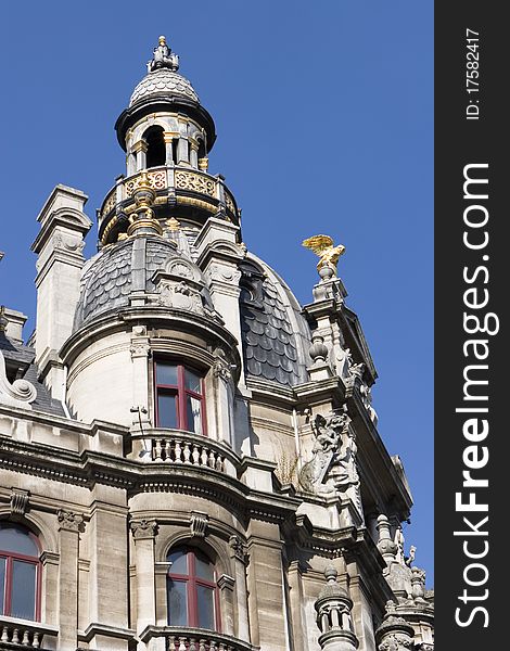 Historic Building With Golden Owl Statue