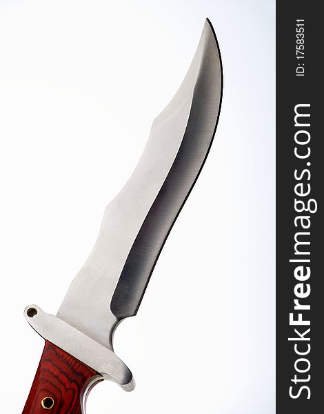 Hunting knife with wooden handle on a white background. Hunting knife with wooden handle on a white background