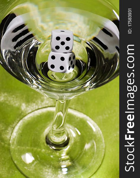 Dice in a vodka martini. Dice in a vodka martini.