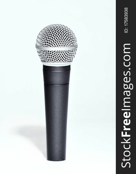 Vocal Microphone with silver wind screen.