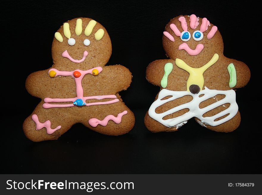 Ginger Bread Man and Woman on a black background. Ginger Bread Man and Woman on a black background