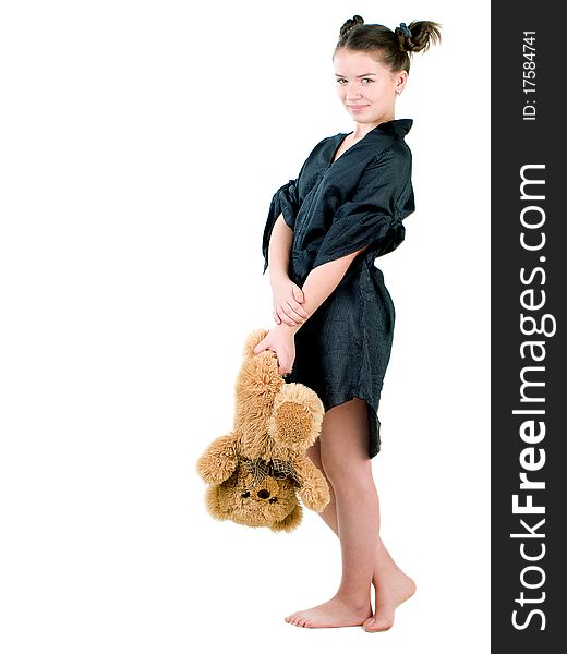 A girl holding her teddy bear. A girl holding her teddy bear