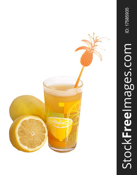 Glass with juice and lemons isolated