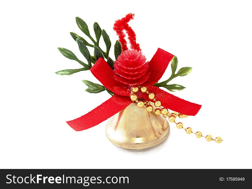 Golden bell with red ribbon isolated