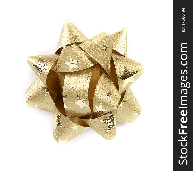 Golden star made from decorative ribbon