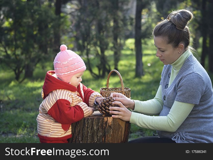 Mother plays the nature with the two-year daughter. Mother plays the nature with the two-year daughter