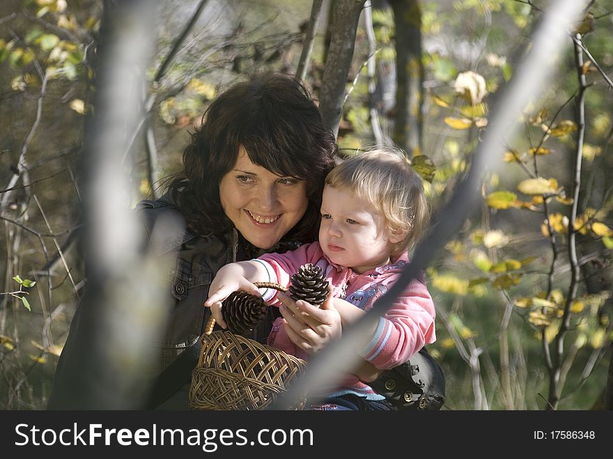 Mother plays the nature with the two-year daughter. Mother plays the nature with the two-year daughter