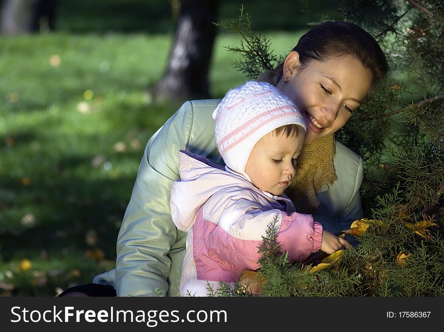 mother plays the nature with the two-year daughter. mother plays the nature with the two-year daughter