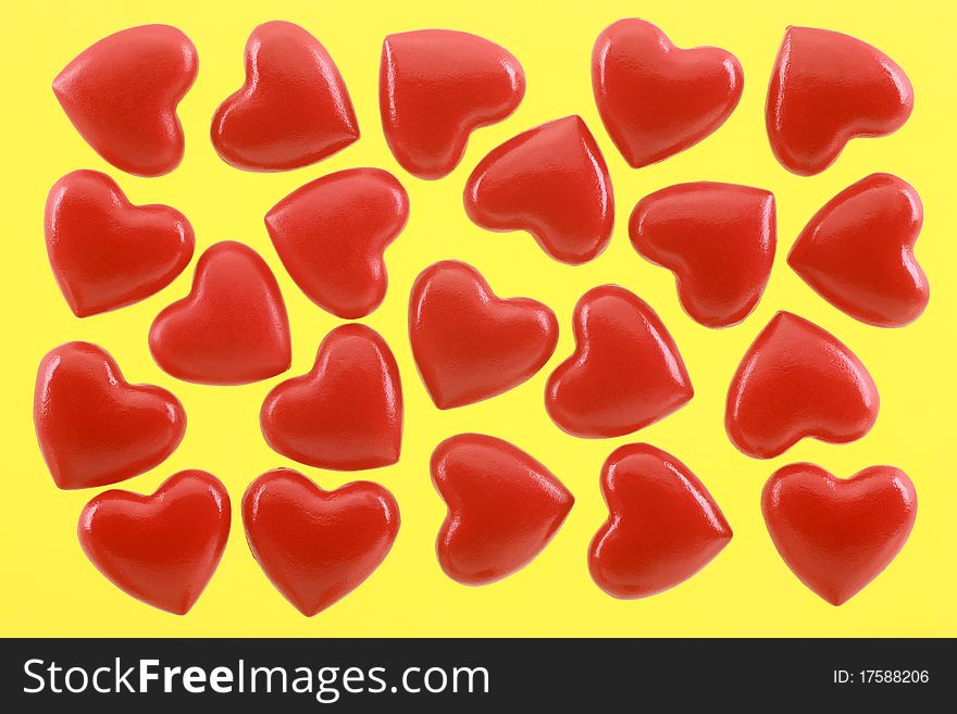 Red symbol hearts on a yellow background. Red symbol hearts on a yellow background