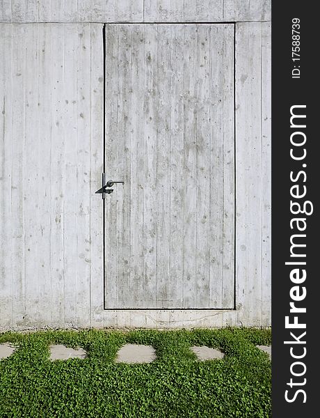 Outside of modern construction, concrete door. Outside of modern construction, concrete door