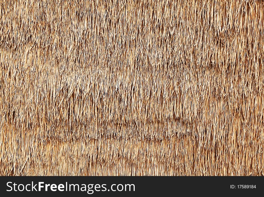 Walls made of dry grass background