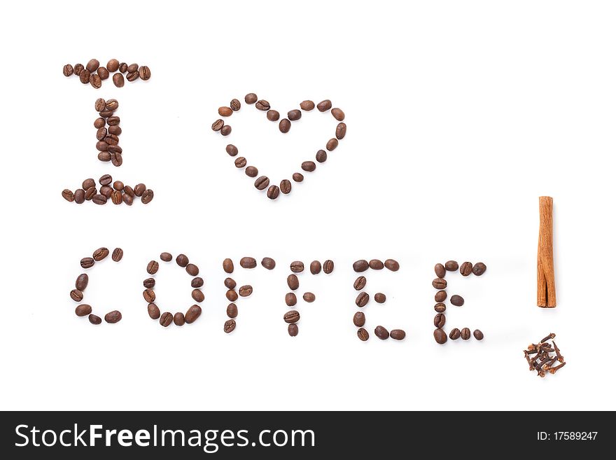 Inscription is made with coffee beans on a white background horizontal frame
