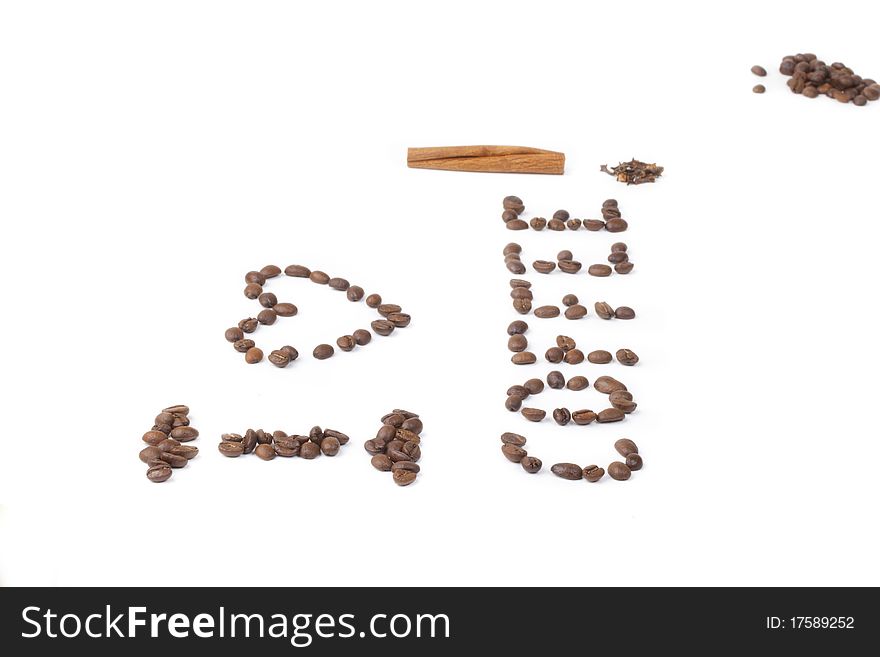 Inscription is made with coffee beans on a white background horizontal frame