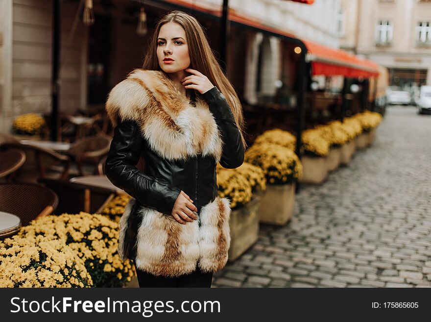 Beauty Fashion Model Girl in Fox Fur Coat.