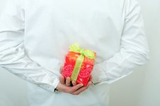 A Gift Behind Back Royalty Free Stock Photos