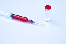 Hypodermic Needle And Medicine Bottle Royalty Free Stock Image