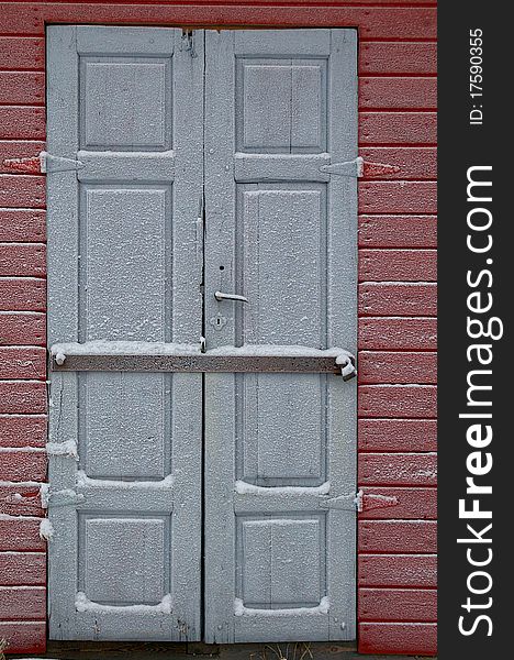 Old frosted door, locked heavily.