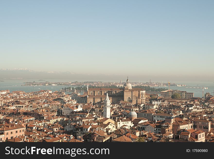 View of the Northern part of Venice with snow on the mountains in the background. View of the Northern part of Venice with snow on the mountains in the background