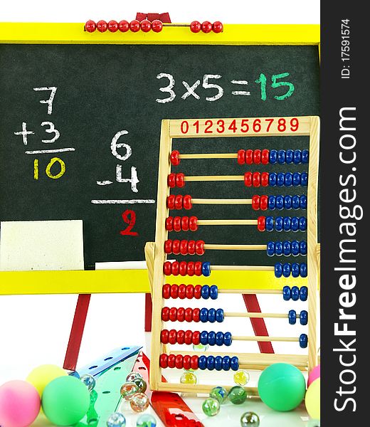 Colorful chalkboard with abacus and marbles