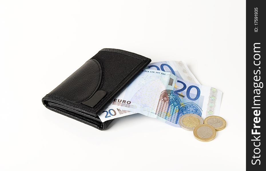 A horizontal image of euro notes sticking out of a black leather mans wallet. A horizontal image of euro notes sticking out of a black leather mans wallet