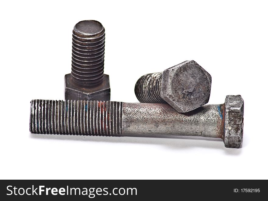 Old bolts with thread on white background