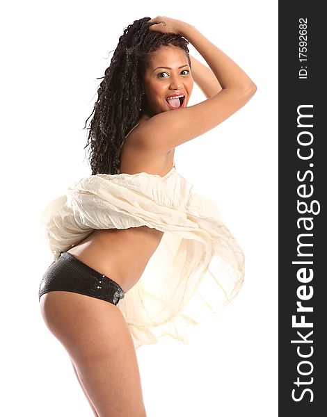 Beautiful and young African American girl having plenty of fun as her dress blows up in the wind, revealing black knickers. Studio shot, on white backdrop. Beautiful and young African American girl having plenty of fun as her dress blows up in the wind, revealing black knickers. Studio shot, on white backdrop.