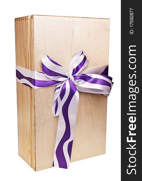 Wooden gift box wrapped in ribbon isolated over white backgrond. Wooden gift box wrapped in ribbon isolated over white backgrond.