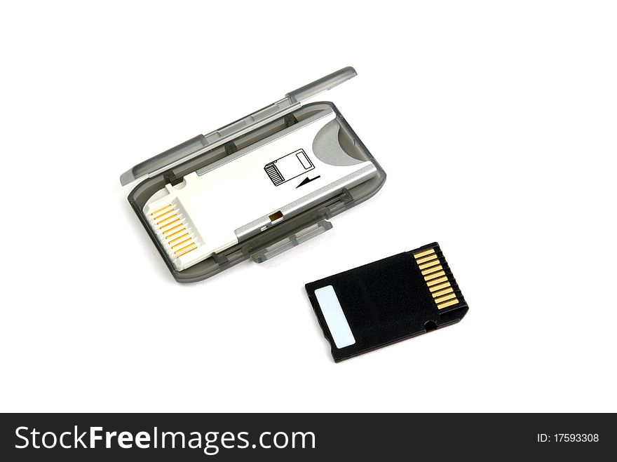 A memory card and the adapter on a white background. A memory card and the adapter on a white background