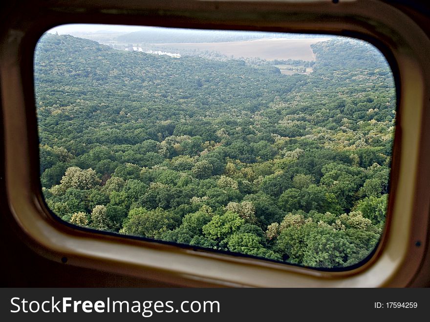 Forest Throught the window of helicopter