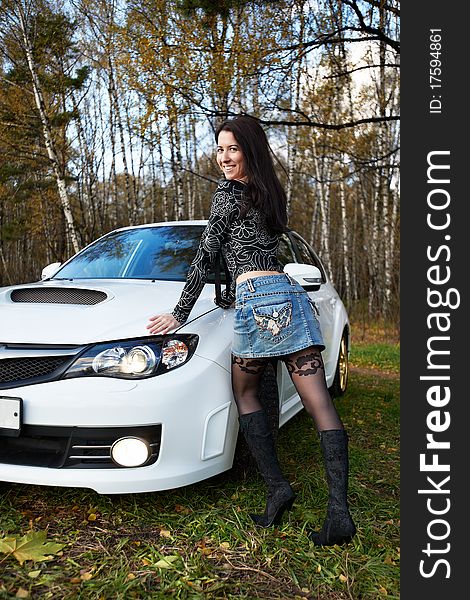 Brunette Girl And Stylish White Car