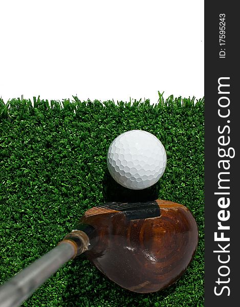 Golf ball and driver on grass with white blank background