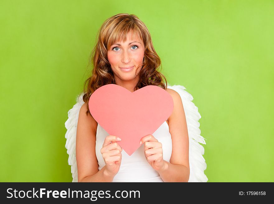 Female valentine angel amor holding heart. Female valentine angel amor holding heart