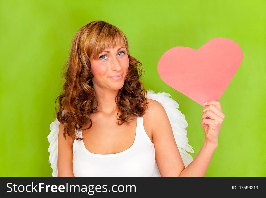 Female valentine angel amor holding heart. Female valentine angel amor holding heart