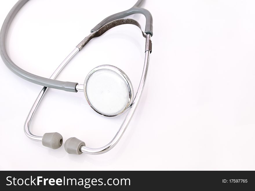 A medical stethoscope on white background.