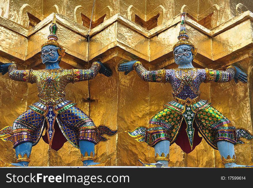 Ceremonial building with specific scuplture of Wat Phra Kaew buddhist temple complex in Bangkok Thailand, Golden Pagoda. Ceremonial building with specific scuplture of Wat Phra Kaew buddhist temple complex in Bangkok Thailand, Golden Pagoda