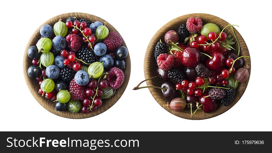Top view. Fruits and berries in bowl on white background. Mixed fruits with copy space for text. Mixed berries isolated on a white background. Various fresh summer.Fruits and berries isolated on white