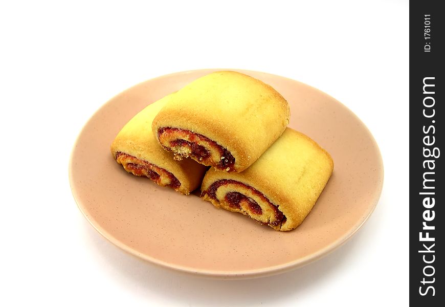 Beautiful cookies on a plate on a white background