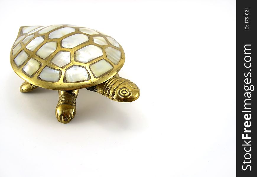 Statue of a turtle on a white background