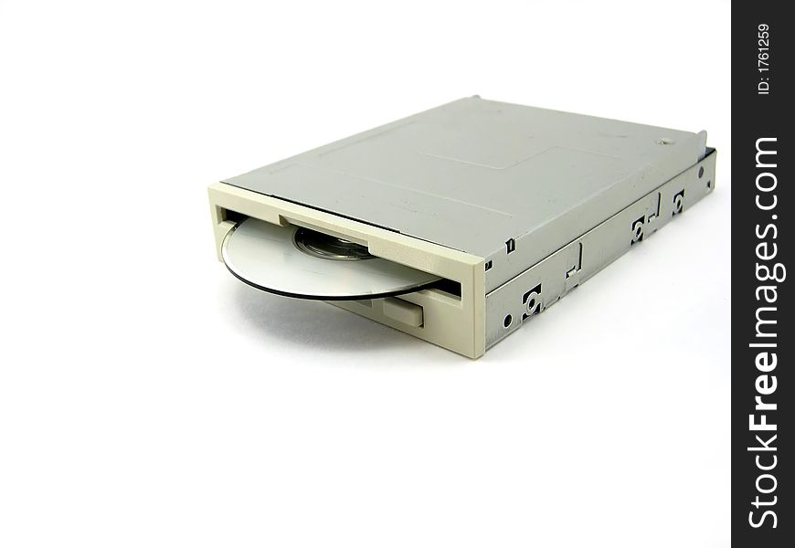 The system device the disk drive with cd on a white background. The system device the disk drive with cd on a white background