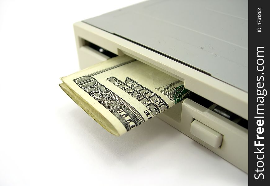 The system device the disk drive with money on a white background. The system device the disk drive with money on a white background