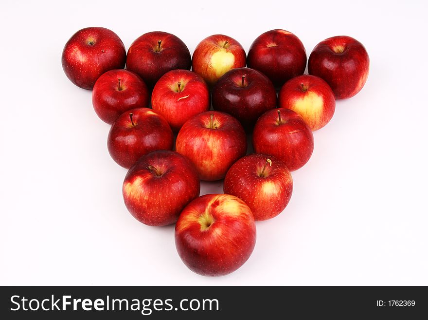 Bunch of apples in the shape of a triangle