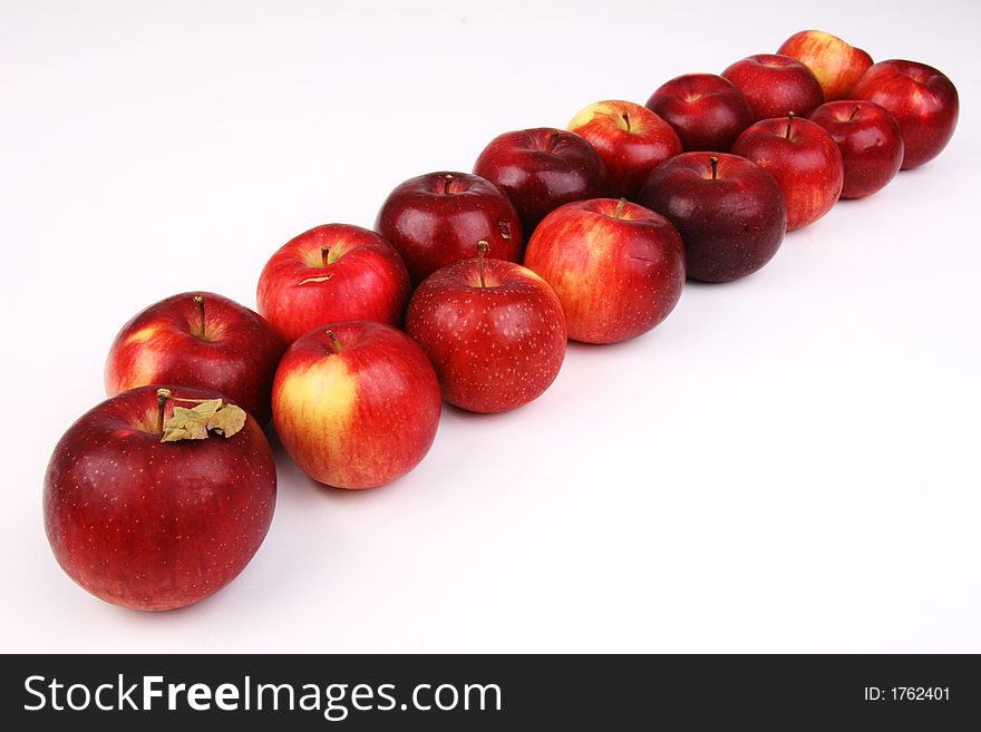 A straight line of apples