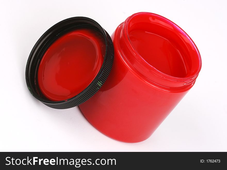 Red finger paint in a plastic jar. Red finger paint in a plastic jar