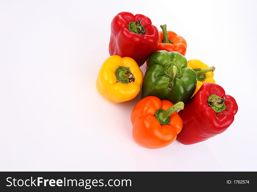 A collection of different colored peppers