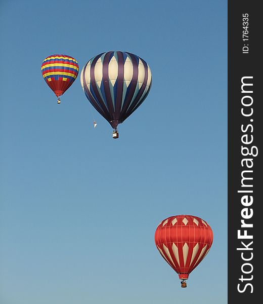 two balloons flying in a festival