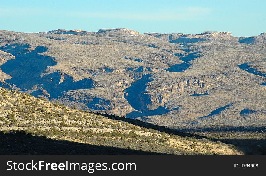 A beautiful view of the desert and mountains. A beautiful view of the desert and mountains.