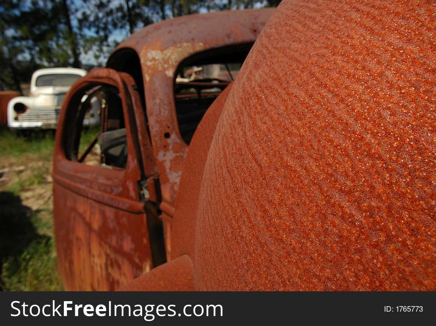 An old car rusting away