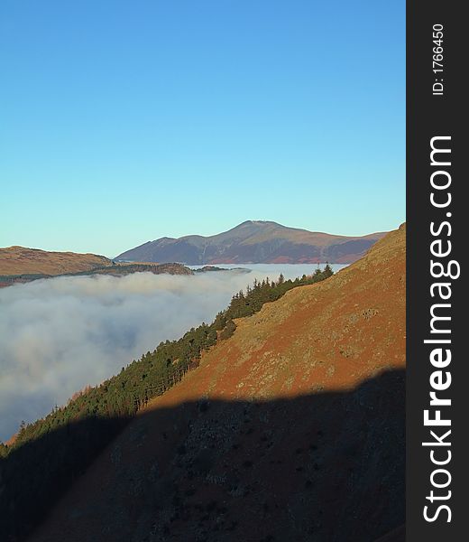 Skiddaw from the slopes of Helvellyn above a sea of low cloud. Skiddaw from the slopes of Helvellyn above a sea of low cloud