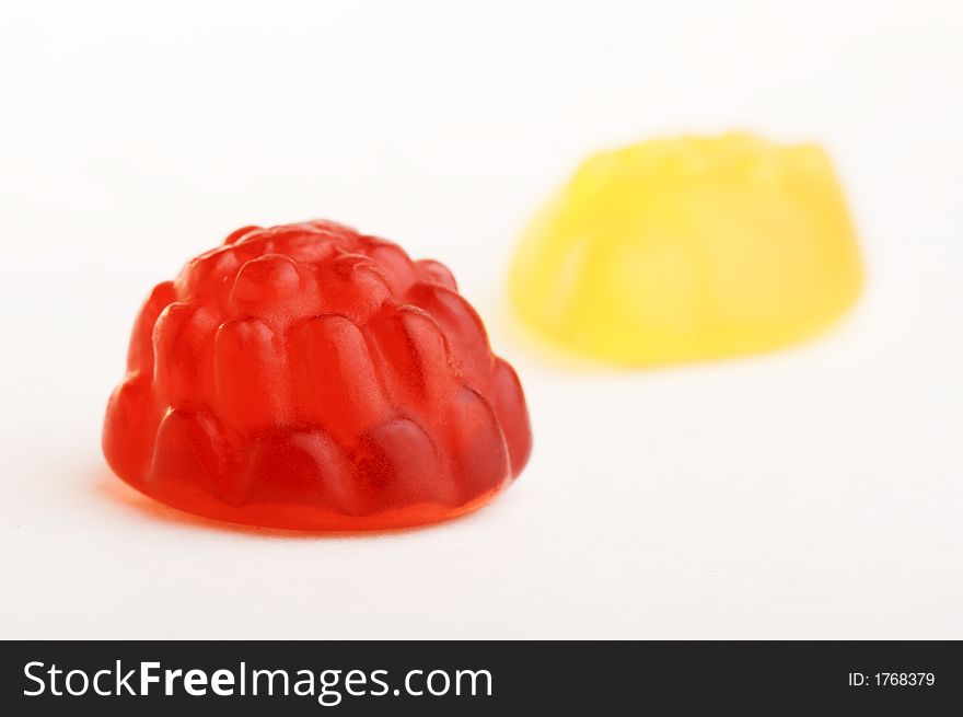 2 not chocolate multi-colored sweets on white background